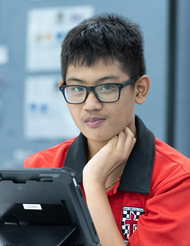 Student learning in the classroom at Xavier College Llandilo