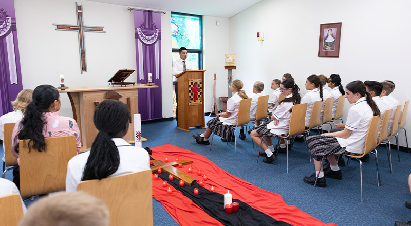 Students during a liturgy in the Navarre Chapel at Xavier College Llandilo