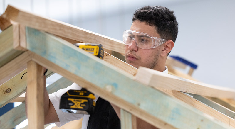 Student working on a timber frame in TAS class at Xavier College Llandilo