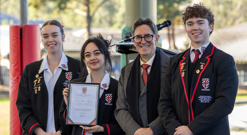 Student leaders receiving awards during school assembly at Xavier College Llandilo