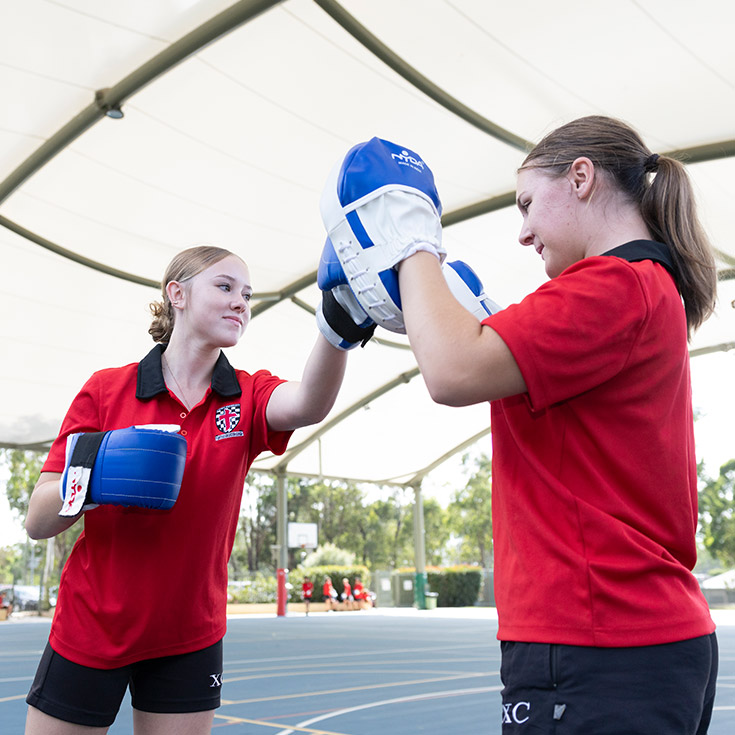 Students practising boxing during PR class at Xavier College Llandilo
