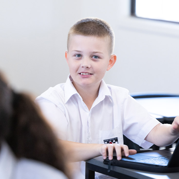 Student learning in the classroom at Xavier College Llandilo