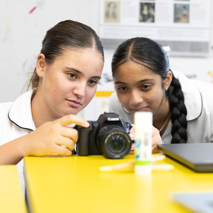 Students using the camera in the classroom at Xavier College Llandilo