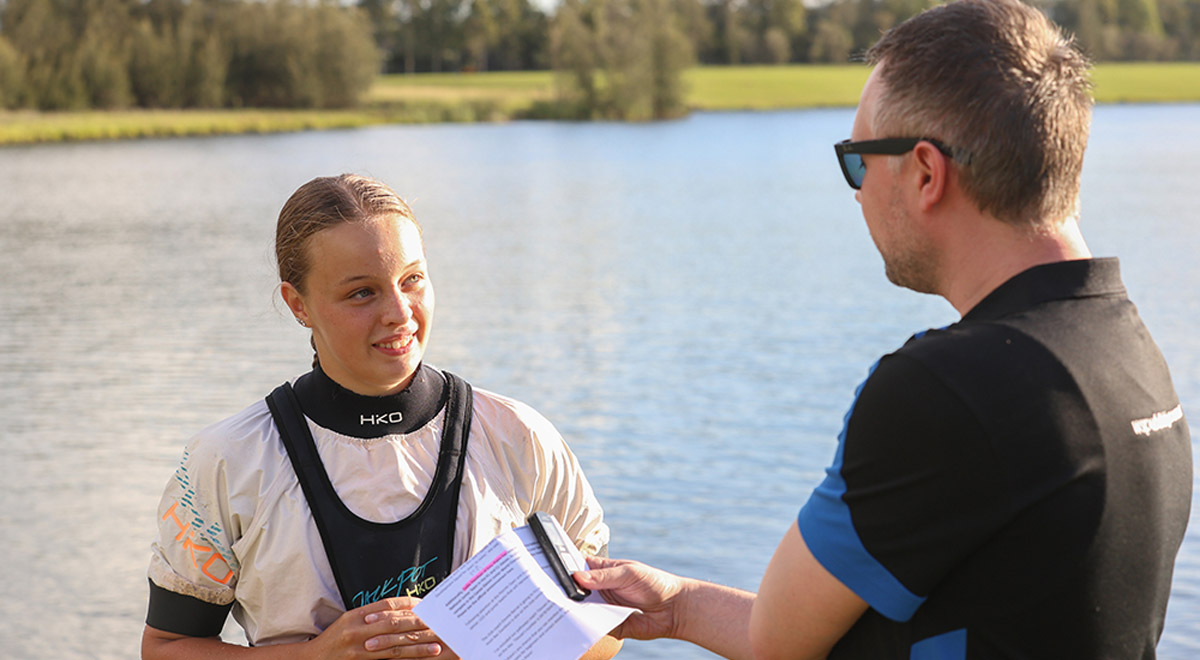 Codie Davidson chatting with journalist Nathan Taylor