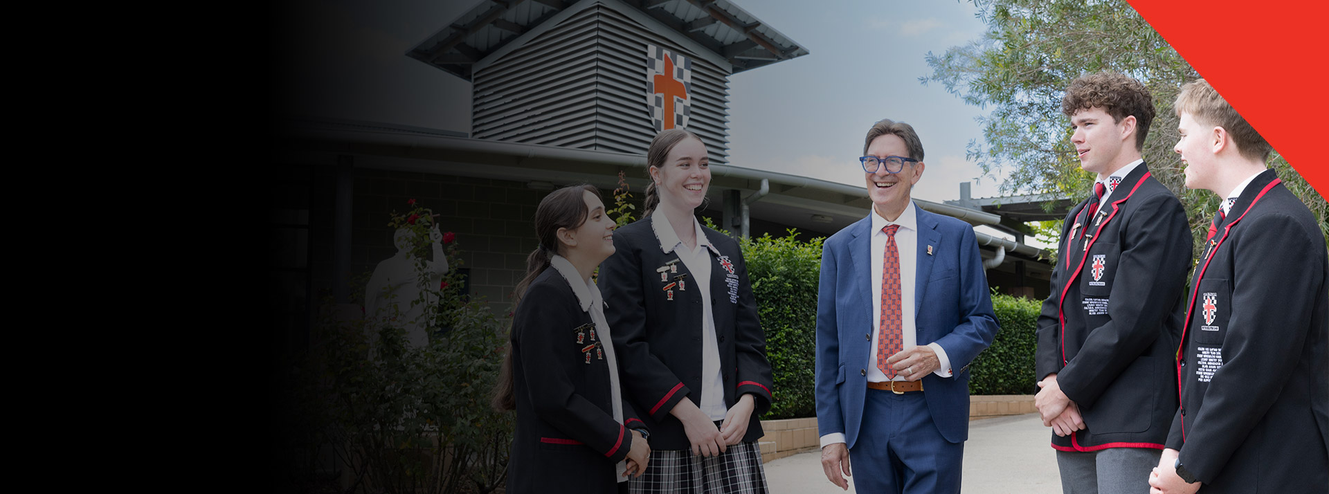 Students walking with their principal Michael Pate through the school grounds at Xavier College Llandilo