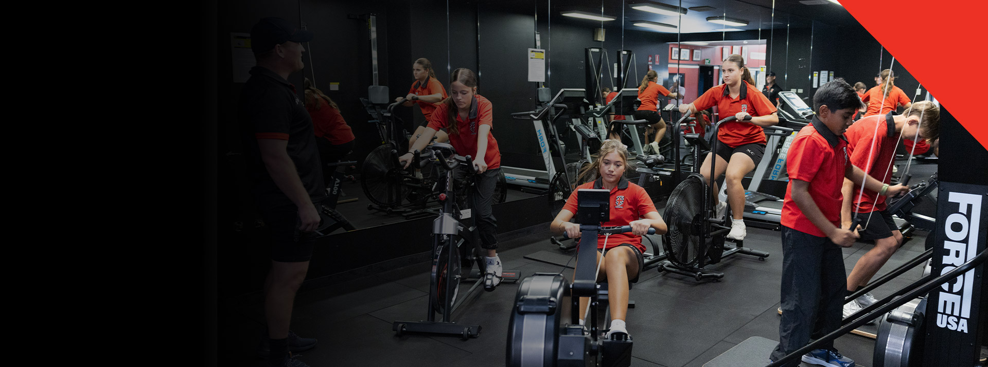 Students working out in the school gym at Xavier College Llandilo