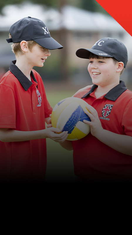 Students playing sport on the school oval at Xavier College Llandilo